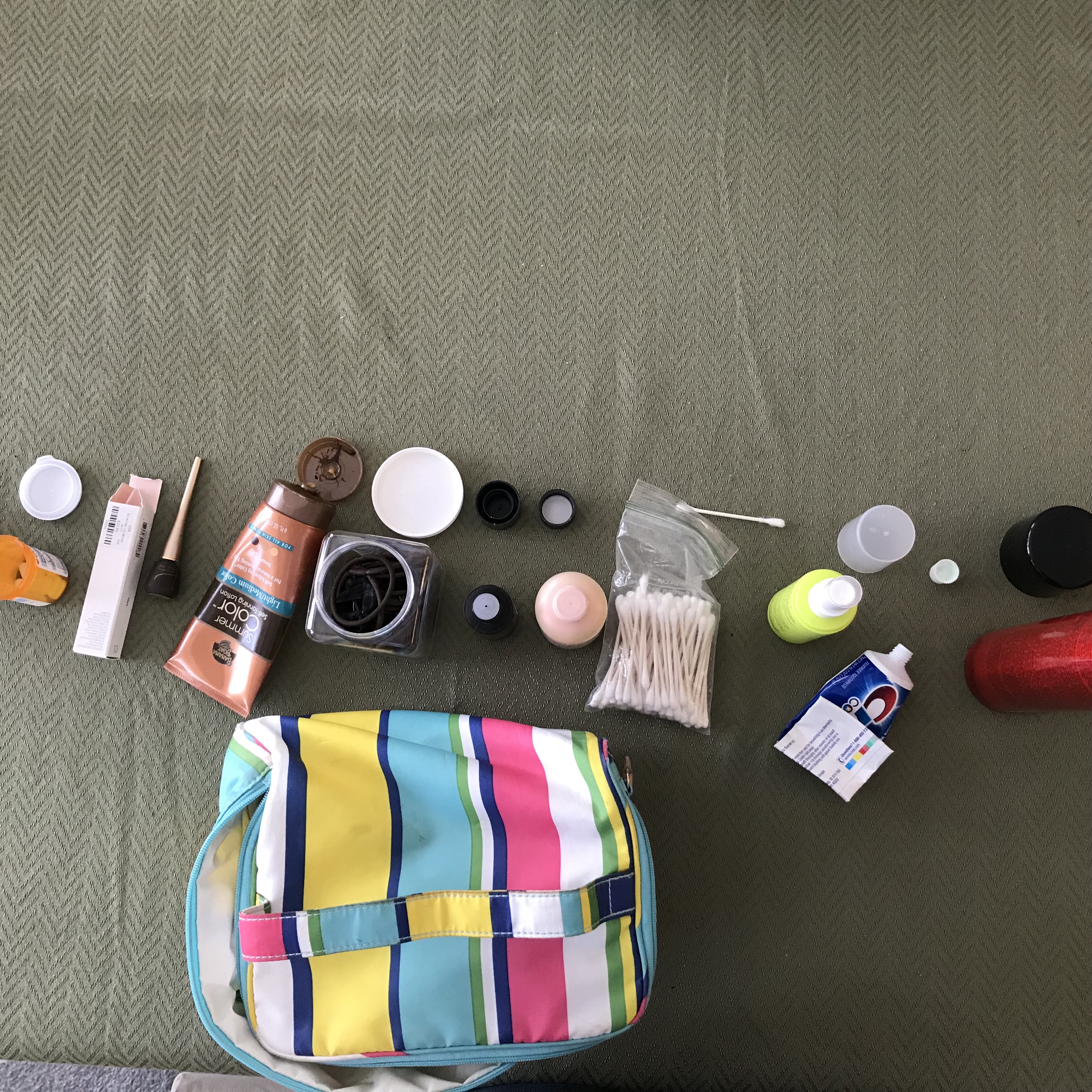 Makeup bag with assorted items