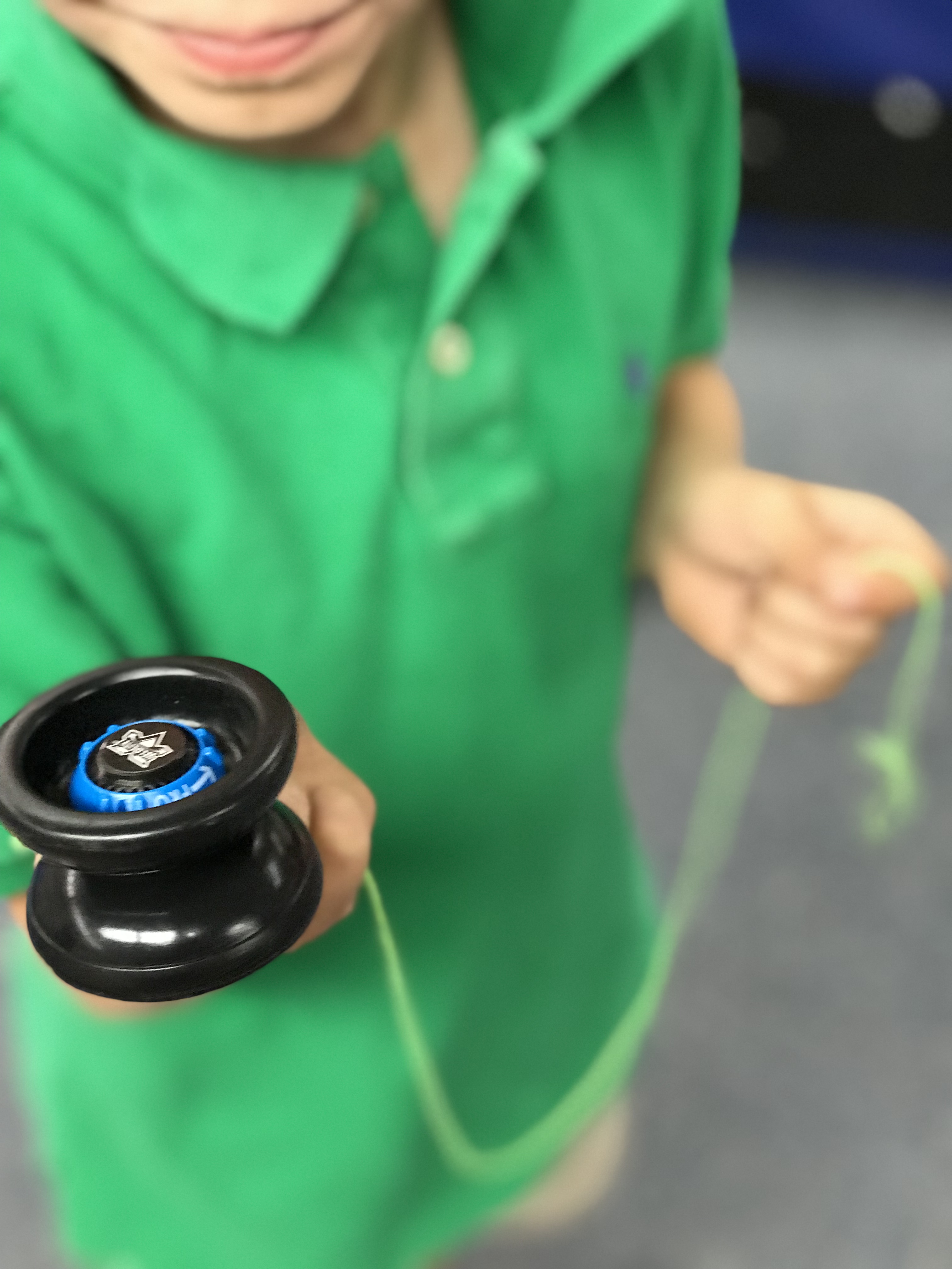 Kid playing with yo-yo