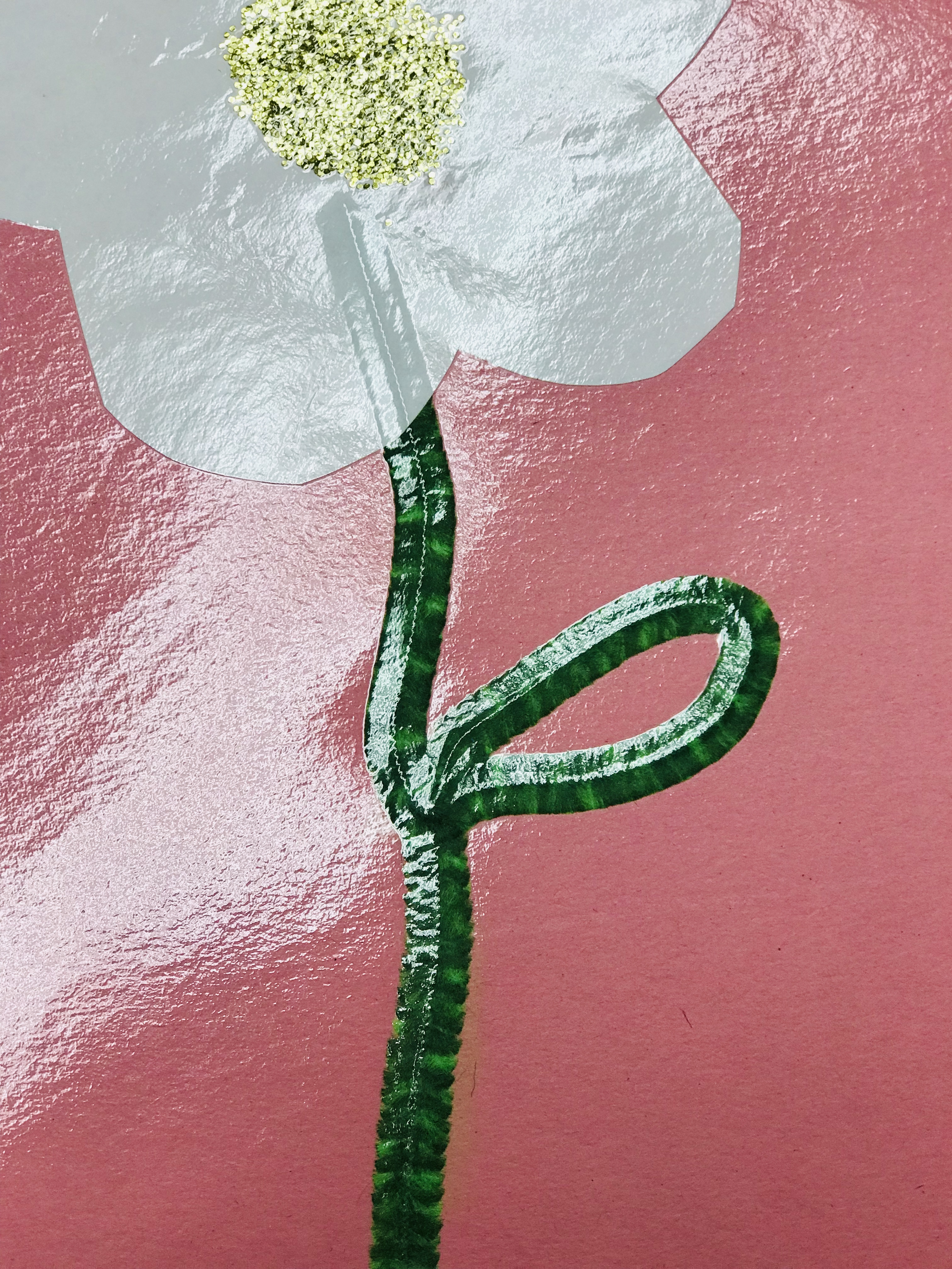 Laminated paper flower with pipe cleaner stem